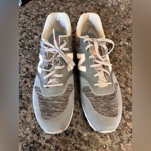 Size 10 New Balance shoes. Never worn.